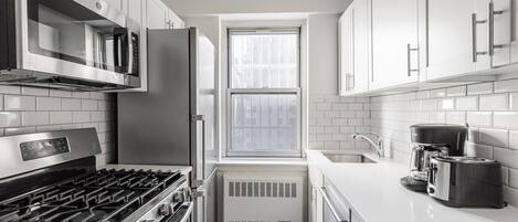 Fridge, microwave, oven, dishwasher