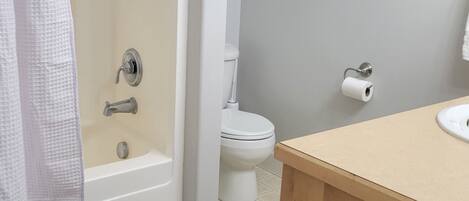 Jetted bath, hair dryer, bidet, towels