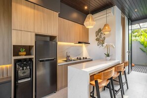 Fridge, microwave, stovetop, coffee/tea maker