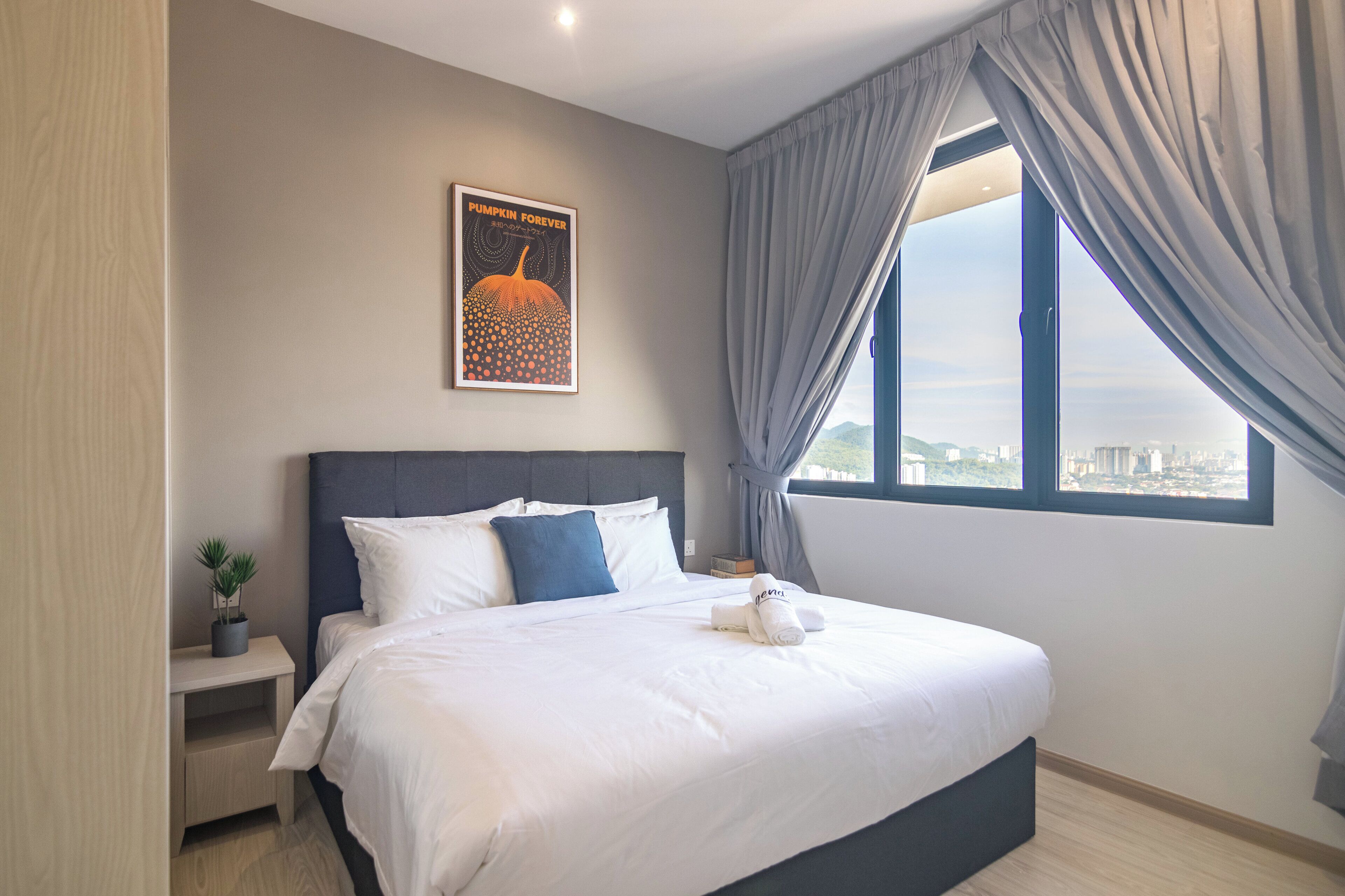 Premium bedding, desk, laptop workspace, blackout curtains