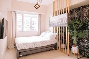 2 slaapkamers, een strijkplank/strijkijzer, internet, beddengoed