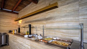 A buffet with various food items and a coffee station. - Trees Art Hotel & Suites (Rhodes)