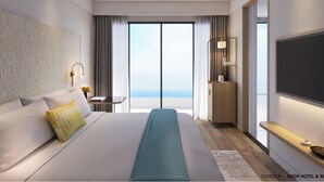 Une chambre d’hôtel moderne avec un grand lit, une table de chevet, une télévision et une vue sur le ciel.