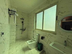 Deluxe Double Room | Bathroom | Shower, free toiletries, towels, soap - Afro Legacy Hotel (Addis Ababa)
