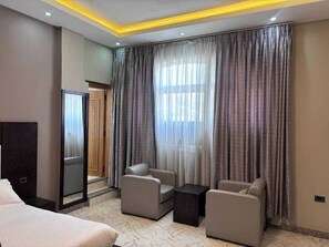 Standard Studio Suite | Desk, laptop workspace, soundproofing, free WiFi - Afro Legacy Hotel (Addis Ababa)