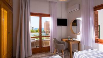 3 habitaciones, tabla de planchar con plancha y cuna de viaje