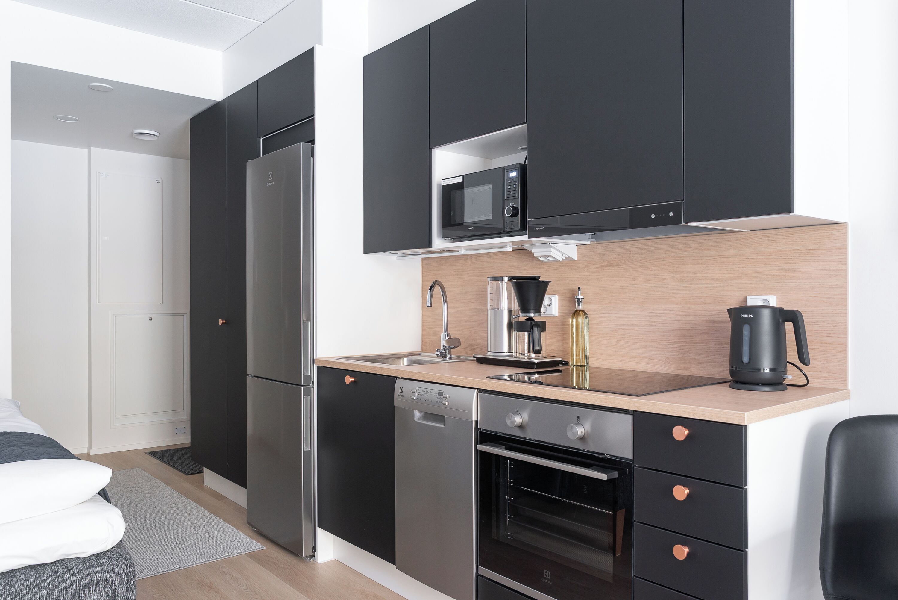 Luksus-studiosuite, hageutsikt | Eget kjøkken | Kjøleskap, mikrobølgeovn, ovn og kokeplater