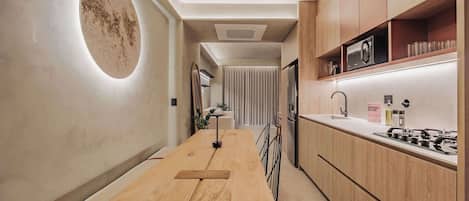 Fridge, microwave, stovetop, coffee/tea maker