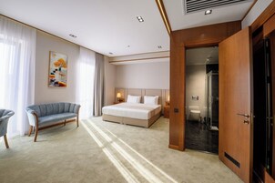 Luxury Room | Minibar, desk, laptop workspace, iron/ironing board