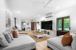 TV, fireplace, books, offices