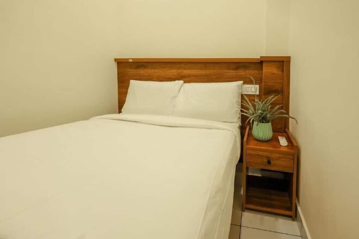 Luxe beddengoed, bedden met traagschuimmatras, een kluis op de kamer