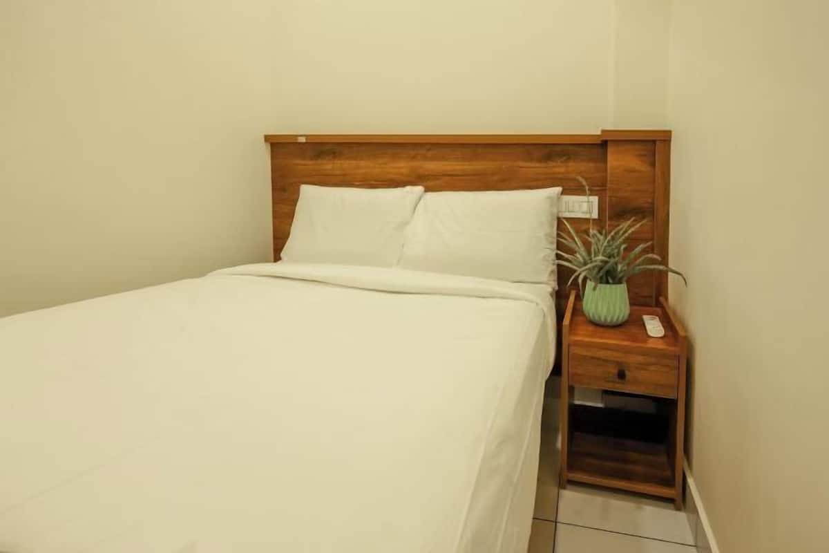 Luxe beddengoed, bedden met traagschuimmatras, een kluis op de kamer