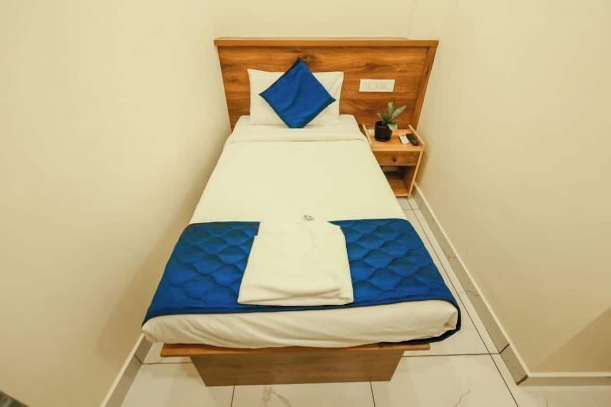 Luxe beddengoed, bedden met traagschuimmatras, een kluis op de kamer
