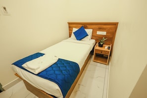 Basic Single Room | Premium bedding, memory foam beds, in-room safe, desk