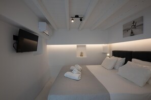 1 slaapkamer, een strijkplank/strijkijzer, wifi, beddengoed