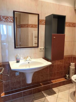 Ducha, secador de pelo
