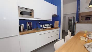 Full-sized fridge, microwave, stovetop, toaster oven