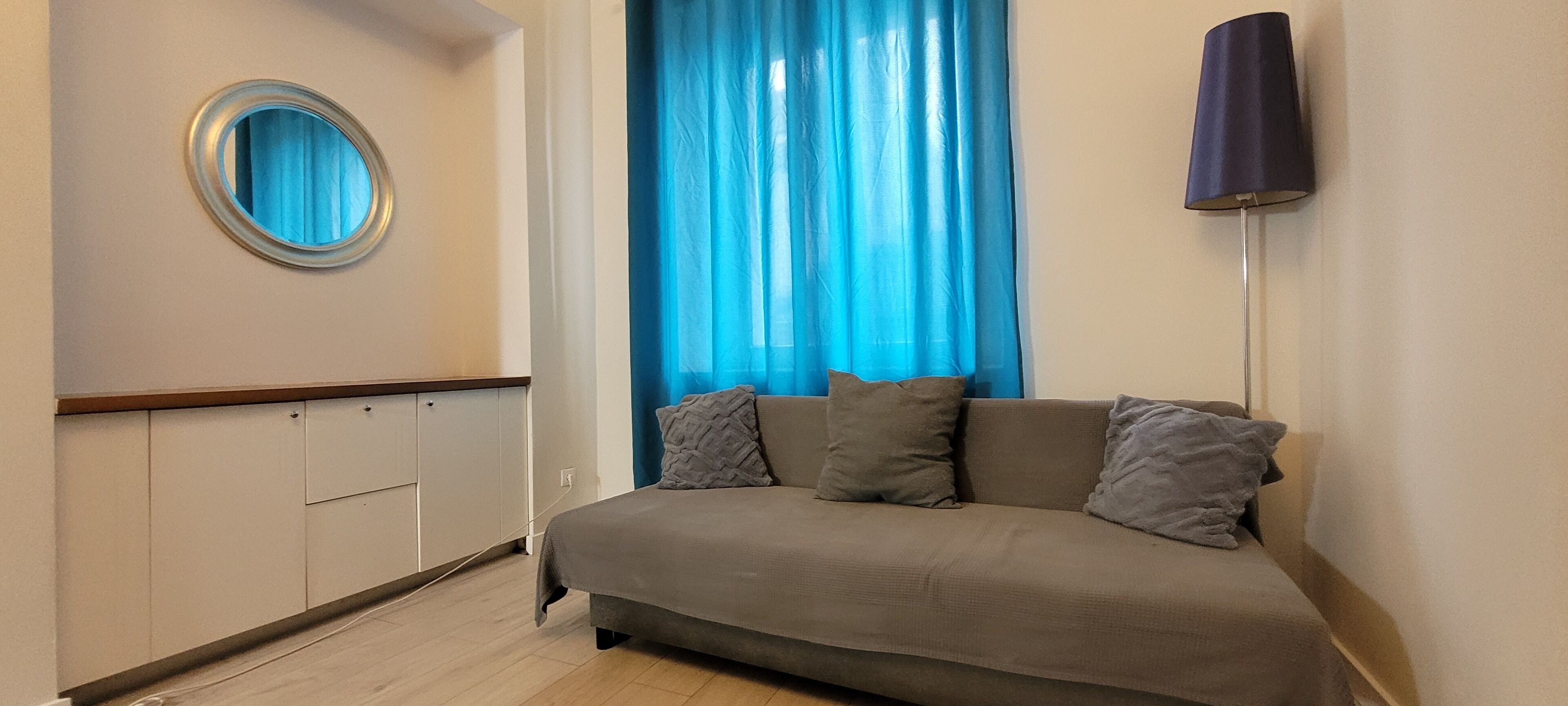 Comfort Quadruple Room | Living area | 32-inch flat-screen TV with cable channels