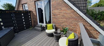 "Discover Ultimate Relaxation at Ferienhaus Friesenbude Safe Haven!"