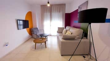 Exclusive Apartment, City View | Living area | TV