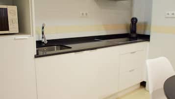Apartamento estándar, vistas a la ciudad | Cocina privada