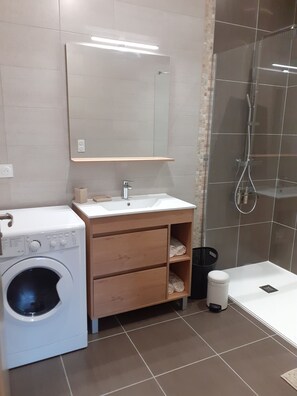Shower, hair dryer, towels, soap