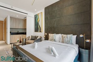 1 bedroom, desk, iron/ironing board, travel crib