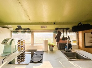 Fridge, microwave, stovetop, coffee/tea maker