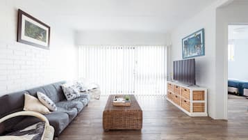 Room, 2 Bedrooms | Living area | 55-inch Smart TV with digital channels