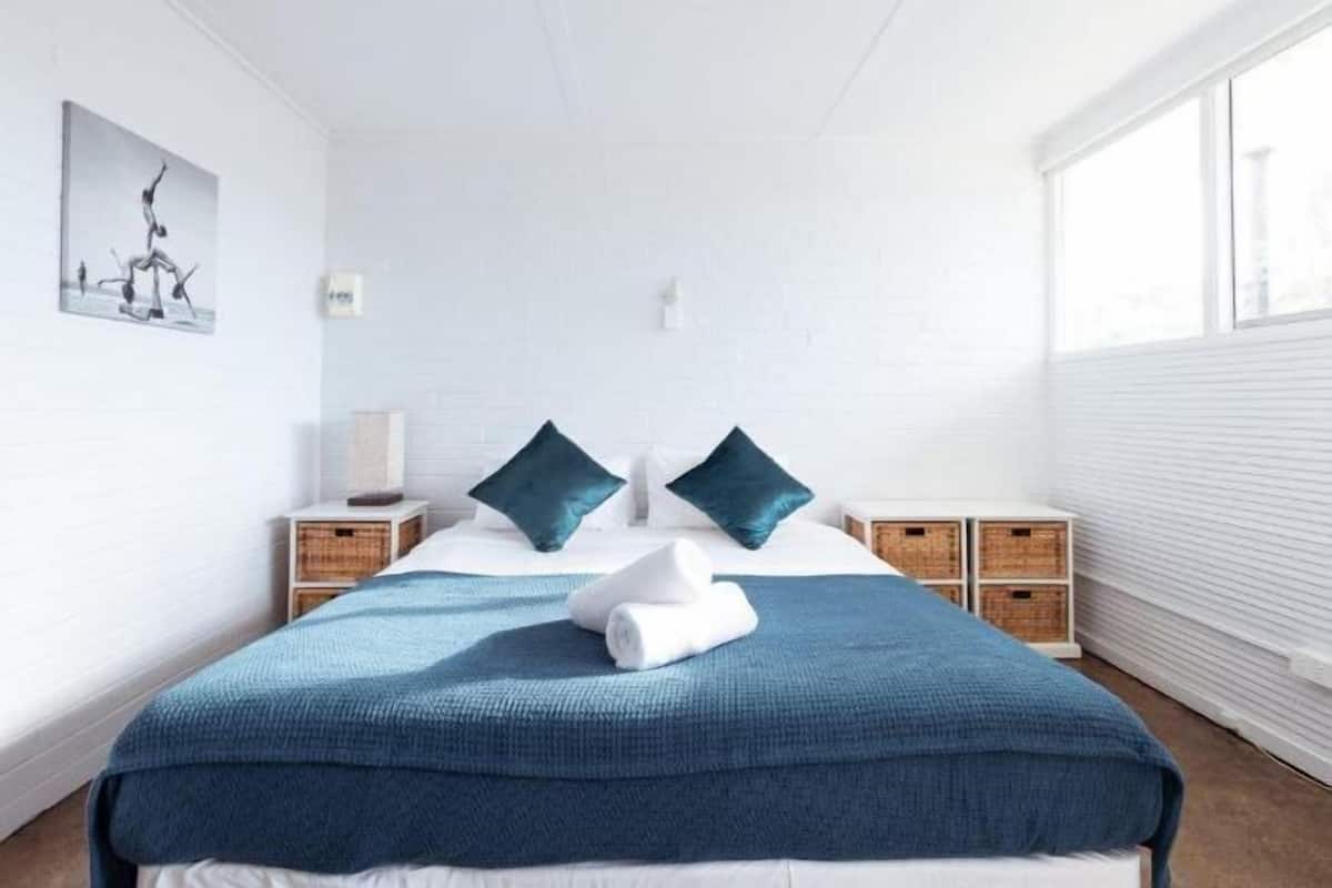 Fer et planche à repasser, draps fournis