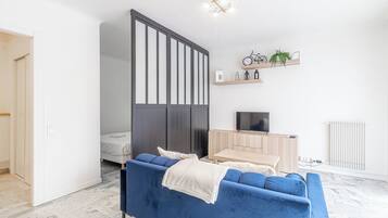 Fer et planche à repasser, Wi-Fi gratuit, draps fournis