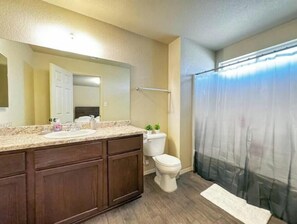 Hair dryer, towels, soap, toilet paper