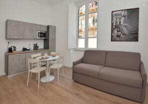 Deluxe-huoneisto | Oleskelualue | Taulutelevisio