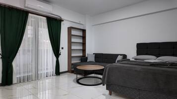 Superior Studio Suite, City View | 1 bedroom, premium bedding, free minibar, desk