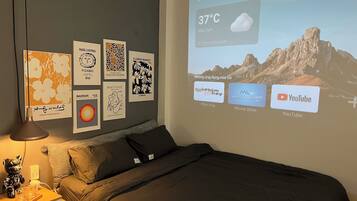 Deluxe Studio | Desk, laptop workspace, blackout drapes, iron/ironing board