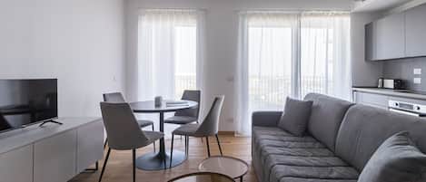 Apartment (2 Bedrooms) | Living area | TV