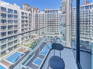 Premium Apartment, 1 Queen Bed, Balcony, Pool View | Balcony view - bnbme - Azizi Riviera 45 - 1 BDR (Dubai)