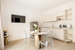 Deluxe Apartment, 1 Bedroom | Private kitchen | Full-size fridge, microwave, stovetop, espresso maker