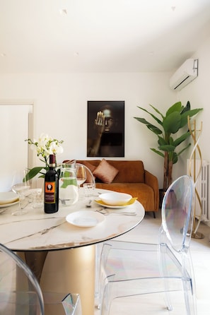 Deluxe Apartment, 1 Bedroom | Living area | 32-inch flat-screen TV with digital channels