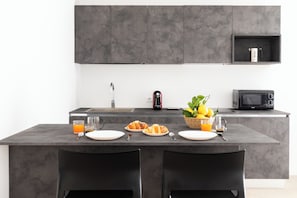 Superior Apartment, 1 Bedroom | Private kitchen | Full-sized fridge, microwave, stovetop, espresso maker - YourHome - Aranci Prestige (Sorrento)