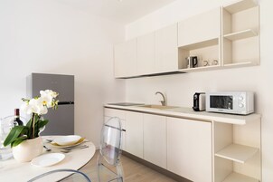 Deluxe Apartment, 1 Bedroom | Private kitchen | Full-size fridge, microwave, stovetop, espresso maker