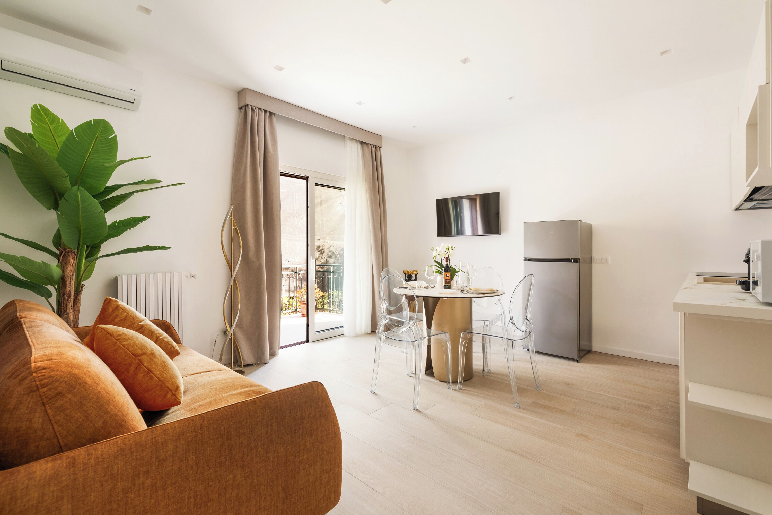 Deluxe Apartment, 1 Bedroom | Living area | 32-inch flat-screen TV with digital channels