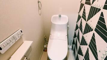 Hair dryer, towels, soap, toilet paper