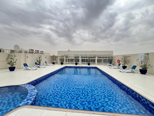 Apartment, Multiple Bedrooms, Accessible, Smoking | Pool | Outdoor pool - Stylish Studio in Dubai - Warsan (Dubai)