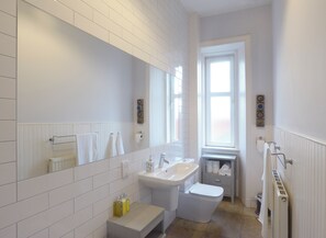 Secadora de cabello, toallas, jabón, papel de baño