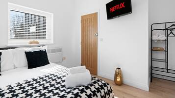 1 slaapkamer, een strijkplank/strijkijzer, gratis wifi, beddengoed