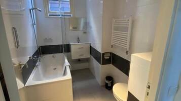 Basic Room, Canal View | Bathroom | Hair dryer, towels, soap, shampoo