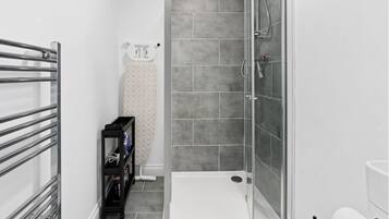 Shower, towels, toilet paper