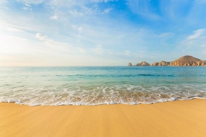 On the beach, sun-loungers, beach towels
