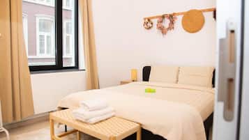 Apartemen | 2 kamar tidur, setrika/meja setrika, Wi-Fi gratis, dan seprai linen